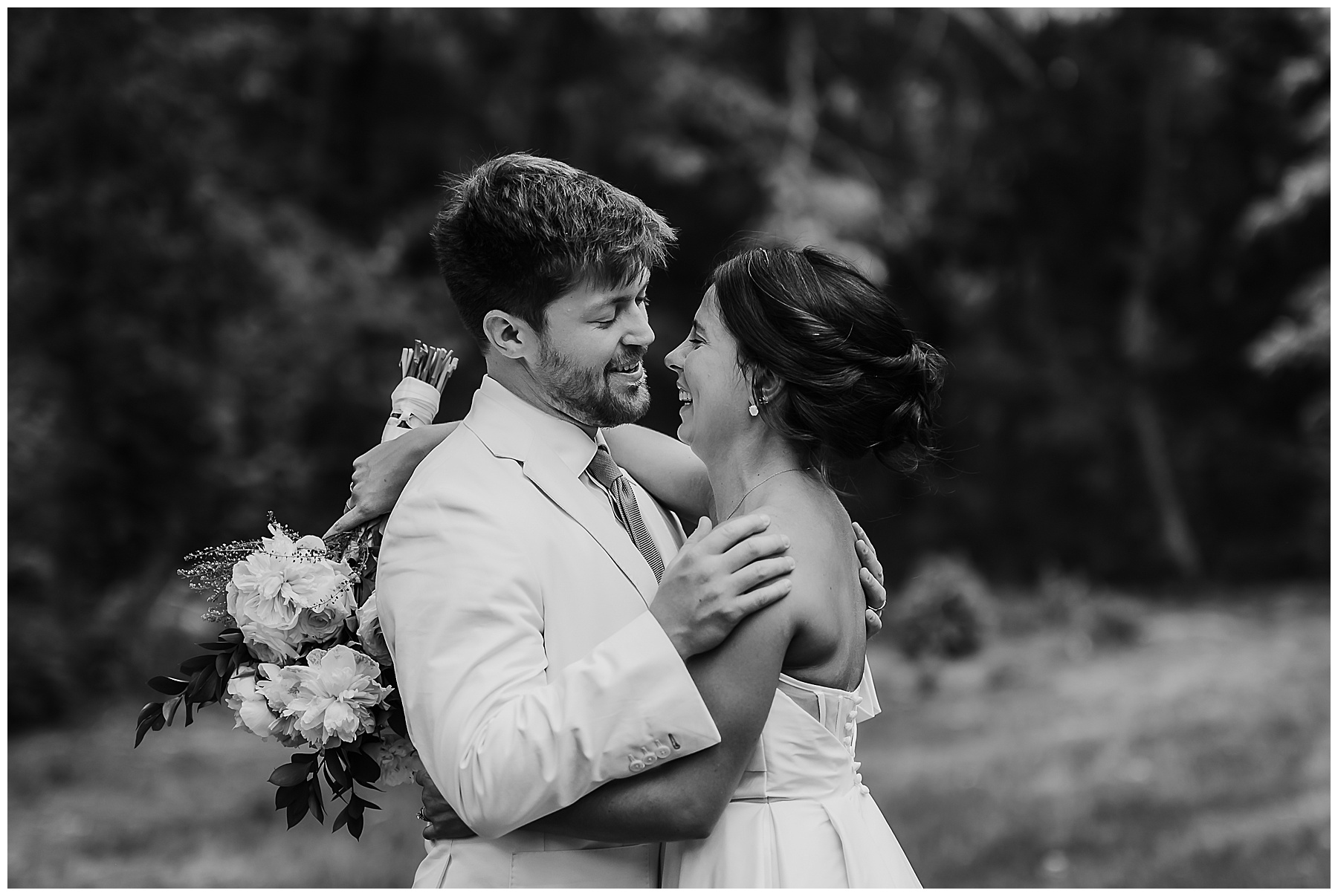 Bride and groom in an embrace.